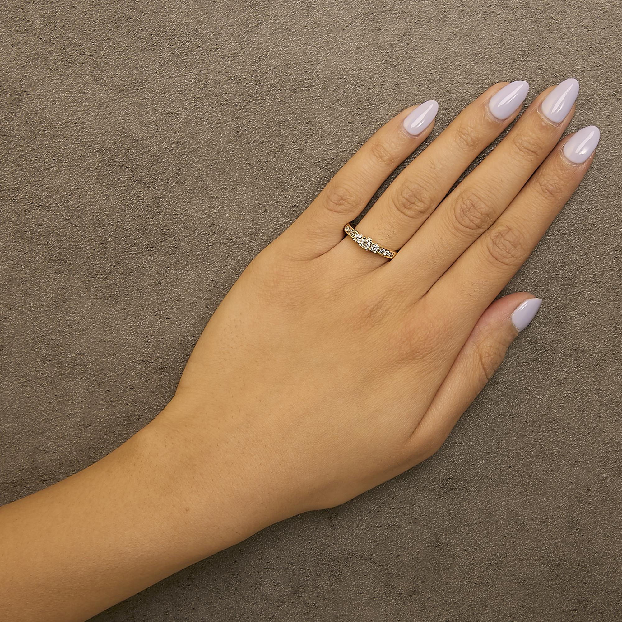 10K Gold 1/2 Cttw Diamond Three Stone Ring